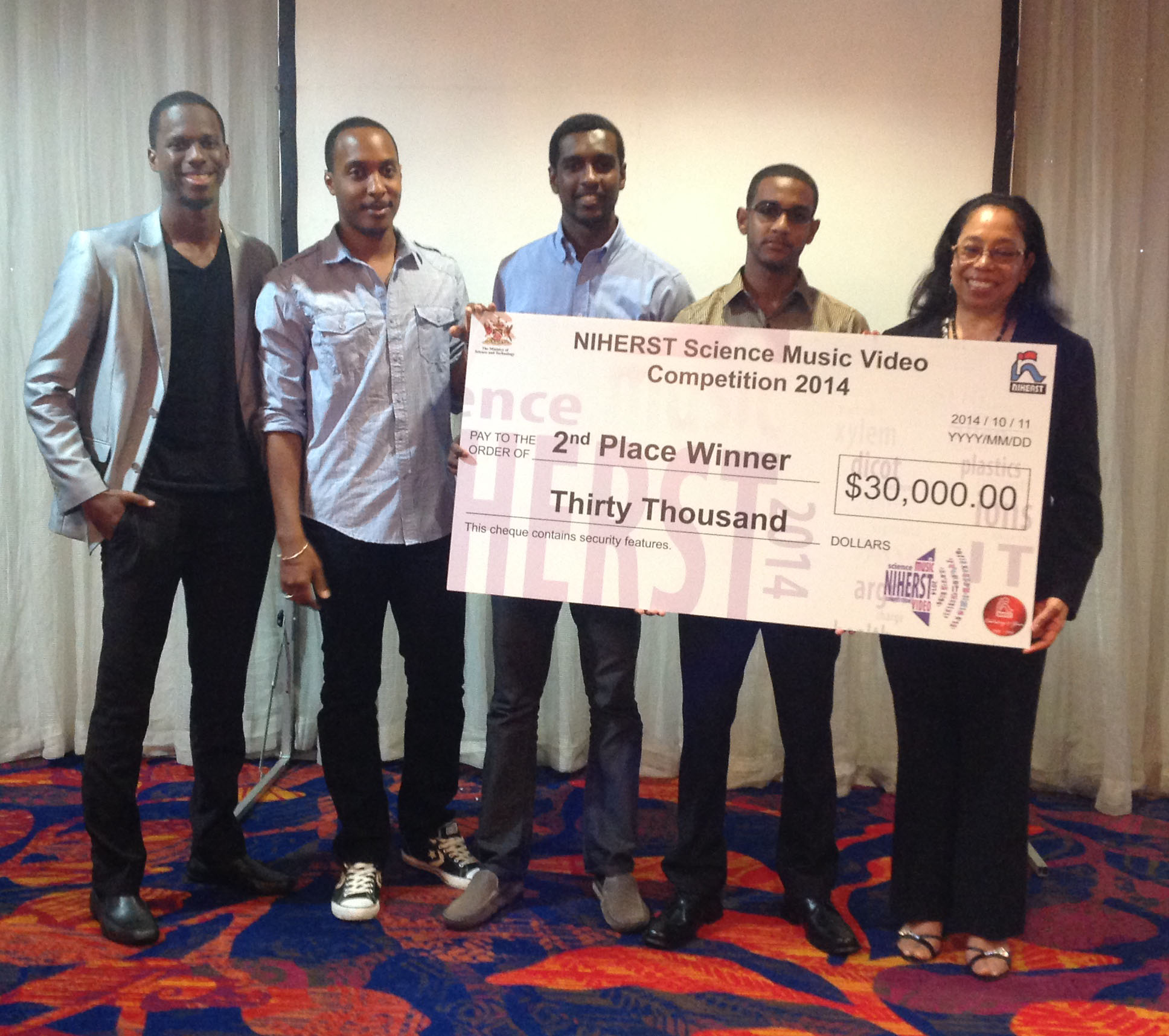 Second place winners (from left): Keron Woodley, Justin Pollonais, Luke Smith and Jerome Smith, with Joycelyn Lee Young 